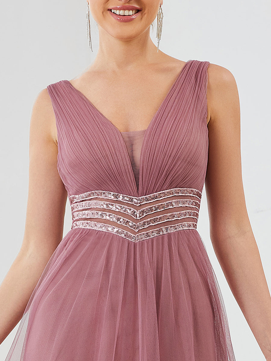 Robe de soirée longue à sequins et col en V sans manches #Couleur_Bordeaux Robe de soirée longue à sequins et col en V sans manches