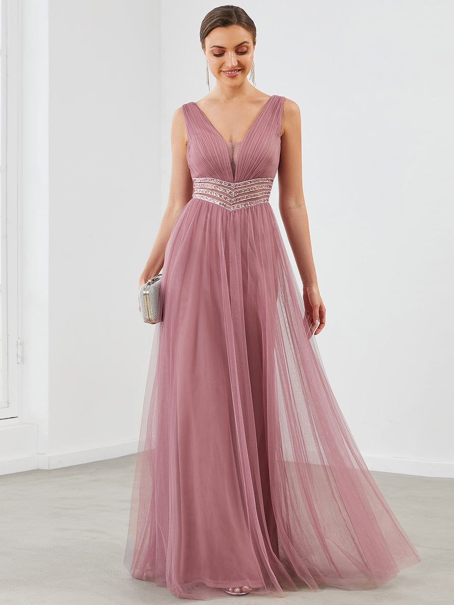 Robe de soirée longue à sequins et col en V sans manches #Couleur_Bordeaux Robe de soirée longue à sequins et col en V sans manches