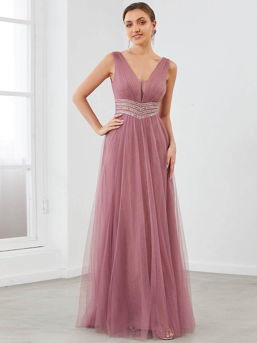 Robe de soirée longue à sequins et col en V sans manches #Couleur_Bordeaux Robe de soirée longue à sequins et col en V sans manches