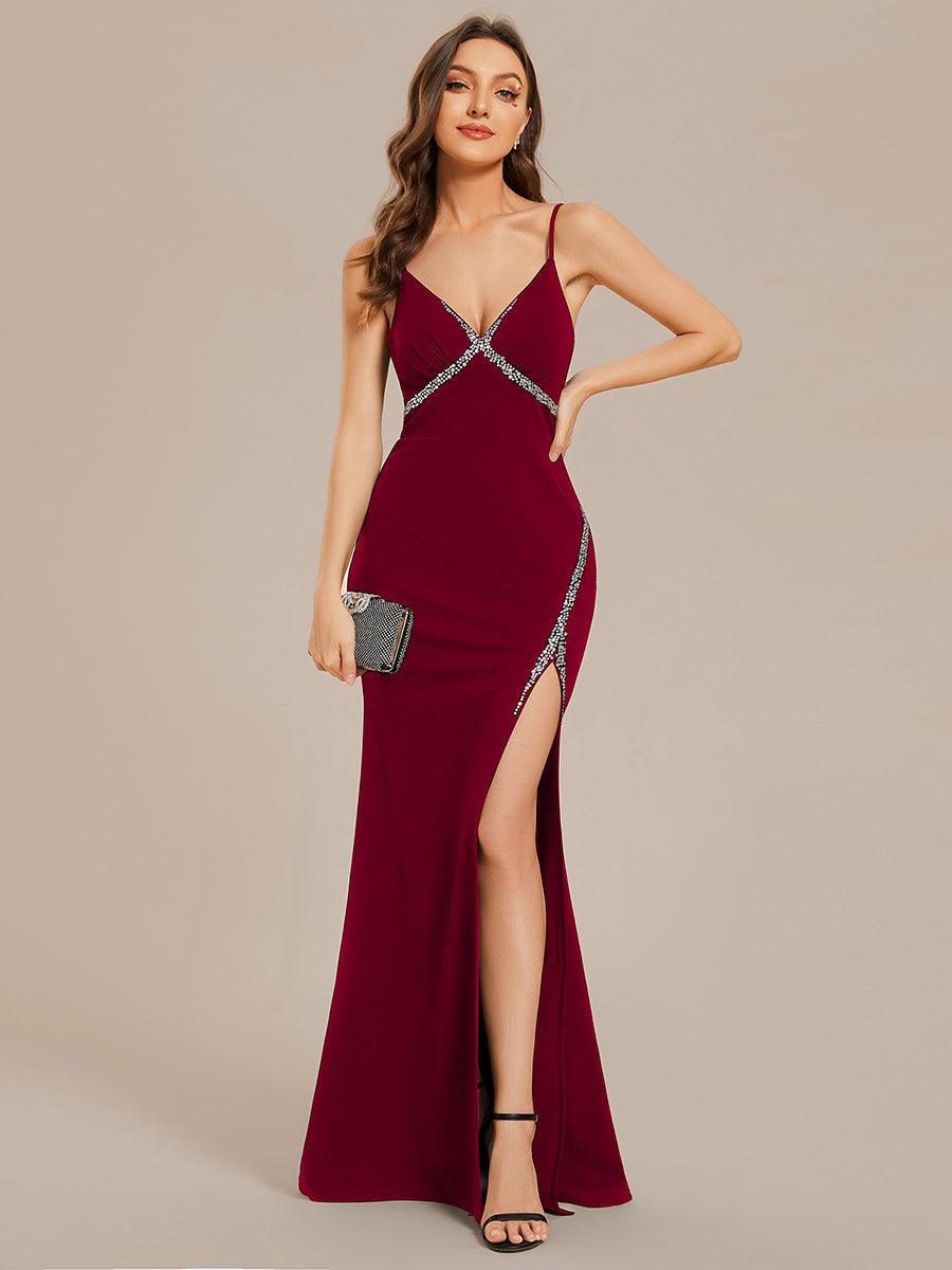 Robe de soirée moulante simple à bretelles spaghetti et fente haute avec strass #Couleur_Noir Robe de soirée moulante simple à bretelles spaghetti et fente haute avec strass