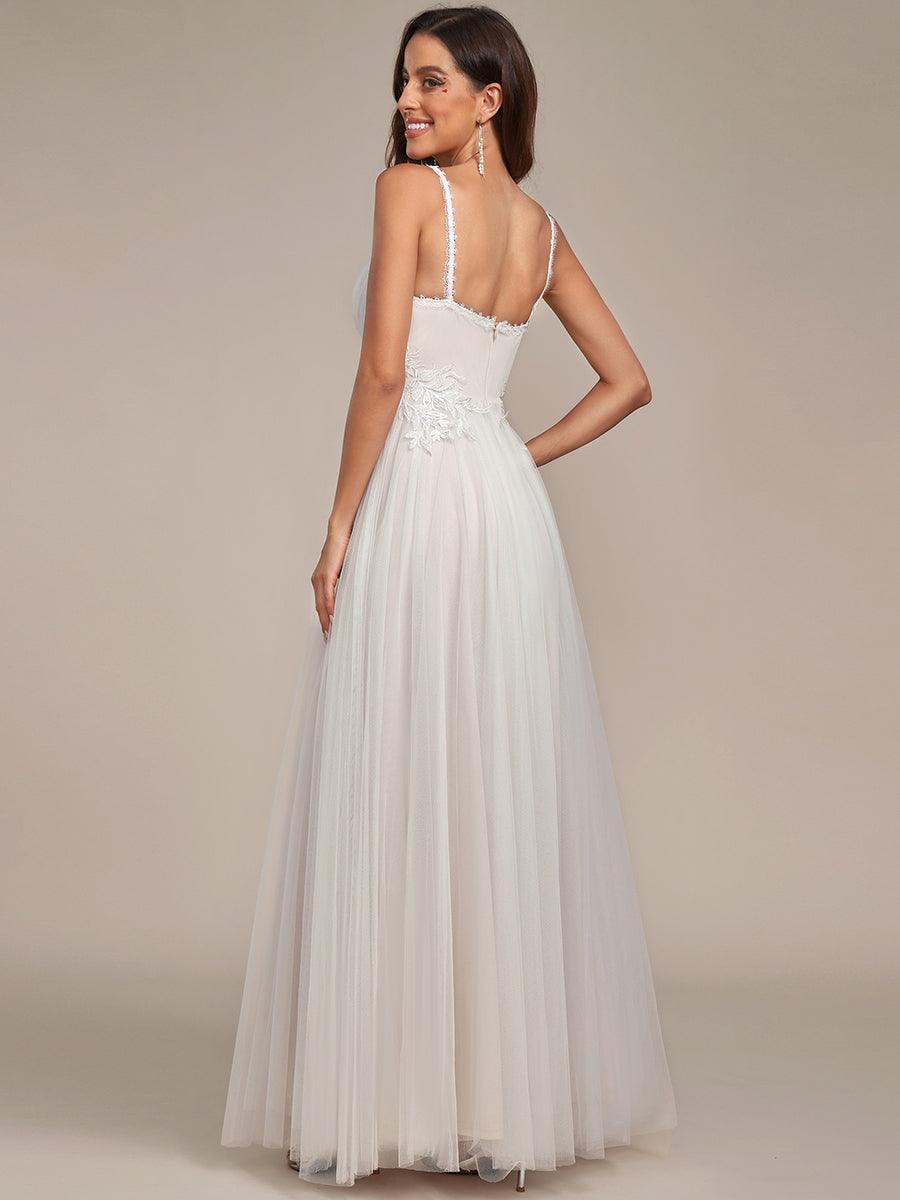 Robe de mariée A-ligne à encolure en V brodée à bretelles spaghetti #Couleur_Ivory