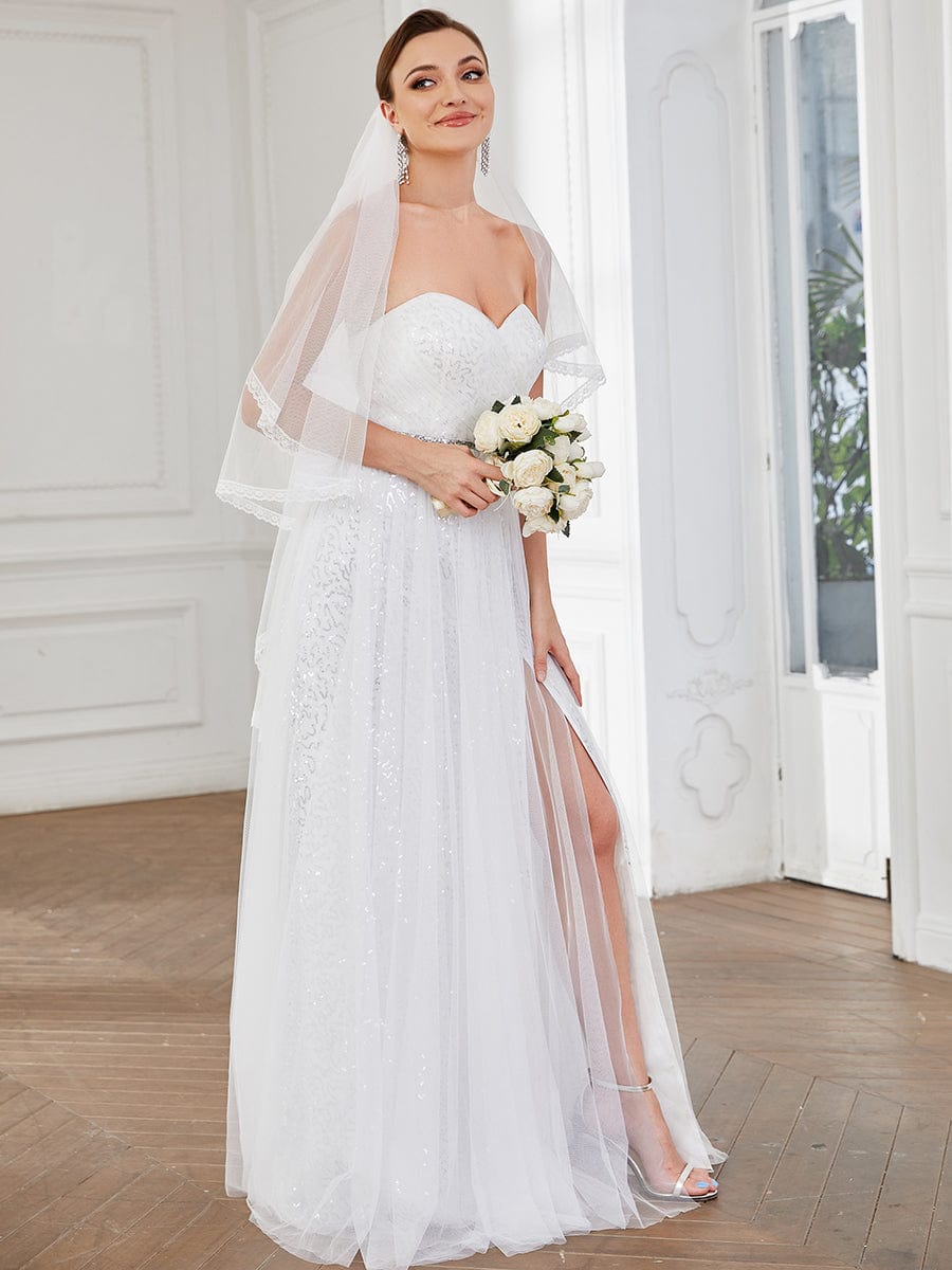 Robe de mariée fendue sur le côté sans manches en dentelle #Couleur_Blanc Robe de mariée fendue sur le côté sans manches en dentelle