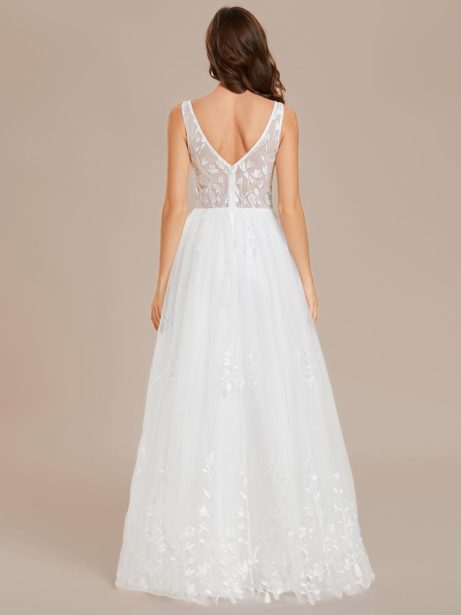 Robe de mariée trapèze brodée sans manches à col en V #Couleur_Blanc Robe de mariée trapèze brodée sans manches à col en V
