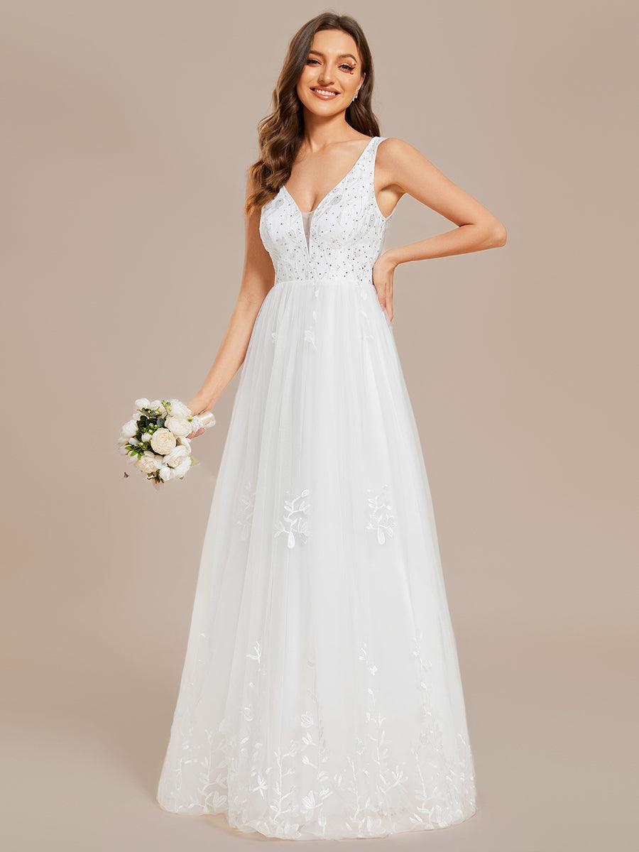 Robe de mariée trapèze brodée sans manches à col en V #Couleur_Blanc Robe de mariée trapèze brodée sans manches à col en V