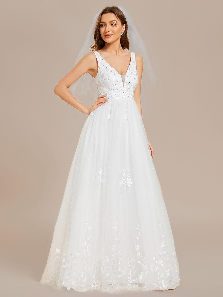 Robe de mariée trapèze brodée sans manches à col en V #Couleur_Blanc Robe de mariée trapèze brodée sans manches à col en V