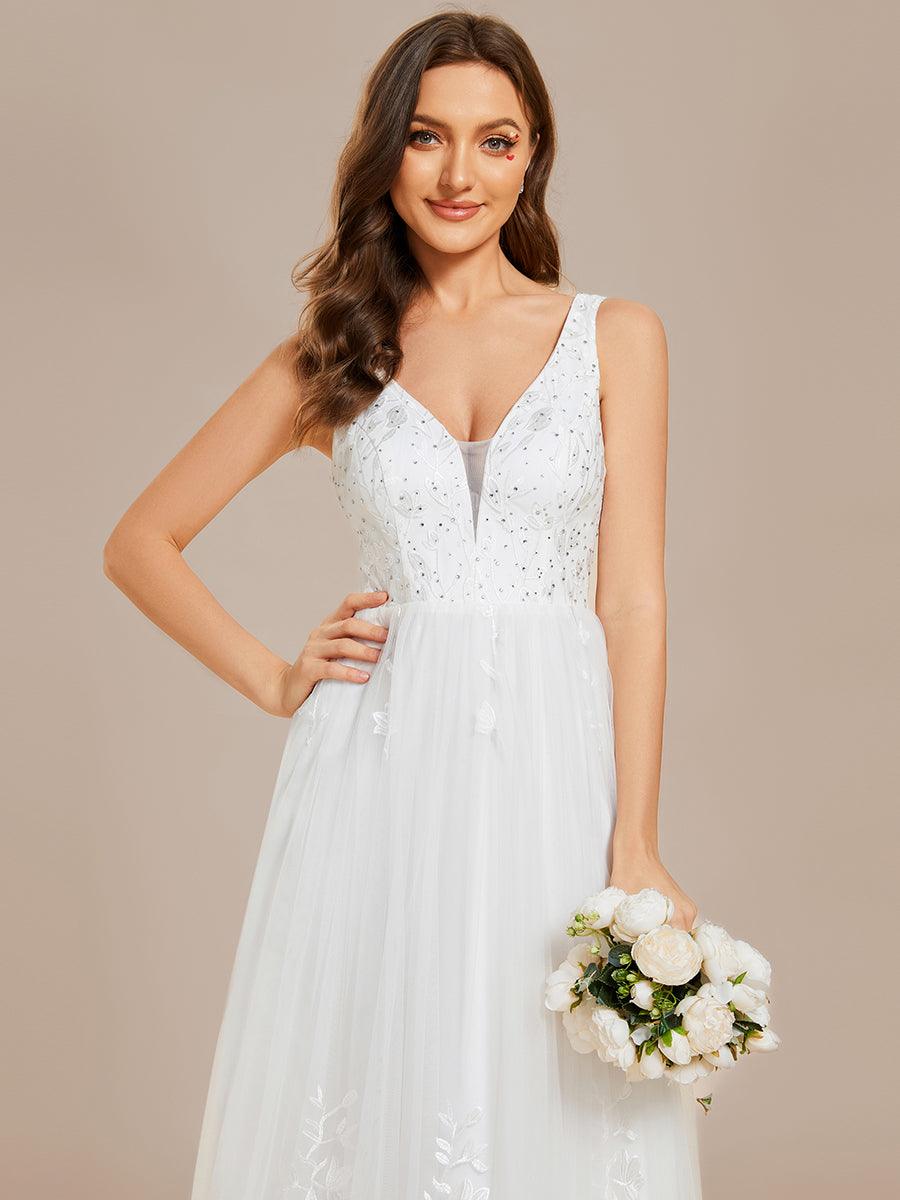 Robe de mariée trapèze brodée sans manches à col en V #Couleur_Blanc Robe de mariée trapèze brodée sans manches à col en V
