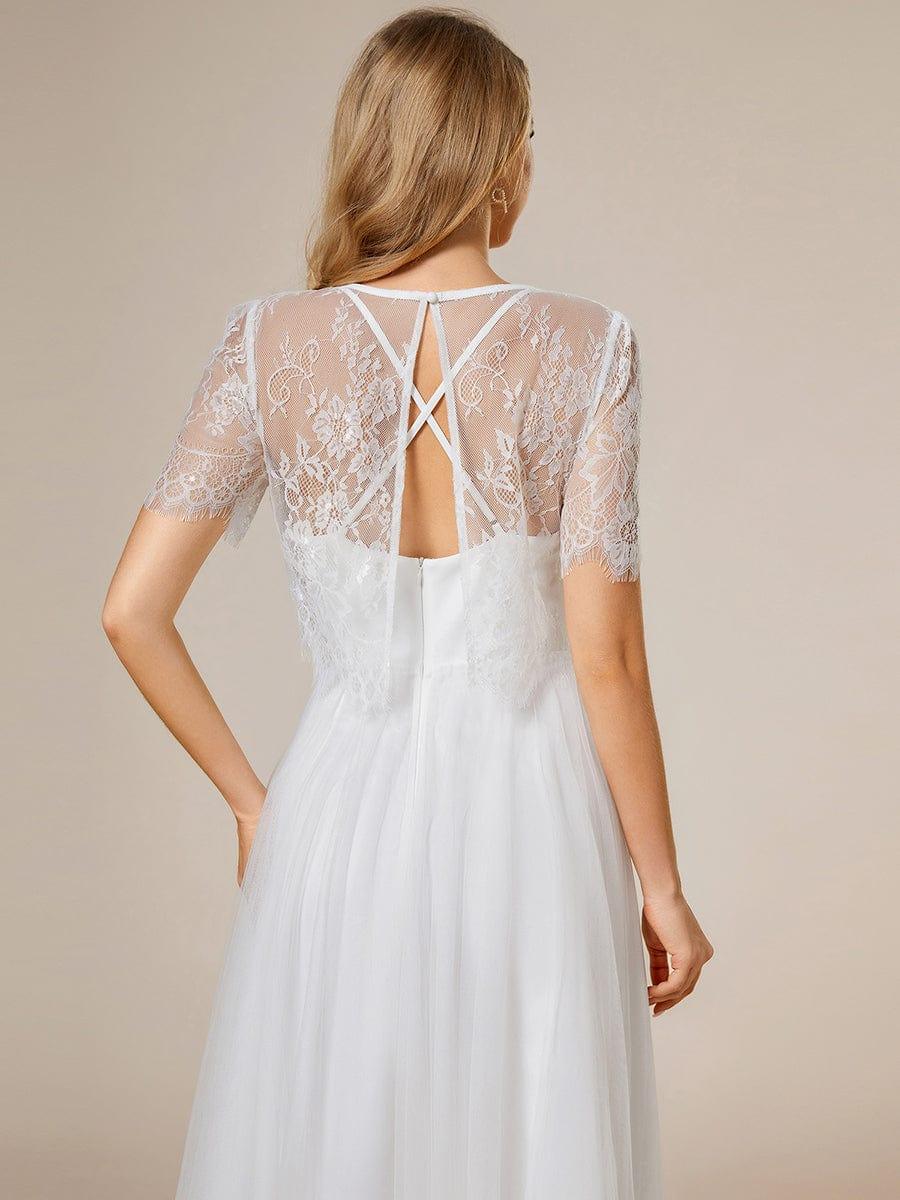 Robe de mariée trapèze avec veste en dentelle et bretelles spaghetti #Couleur_Blanc