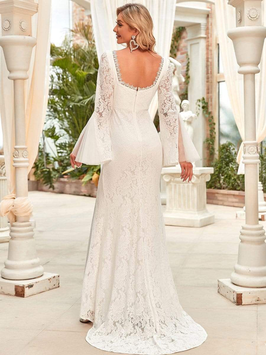 Robe de mariée fendue à manches longues et poignets cloche #Couleur_Blanc Robe de mariée fendue à manches longues et poignets cloche