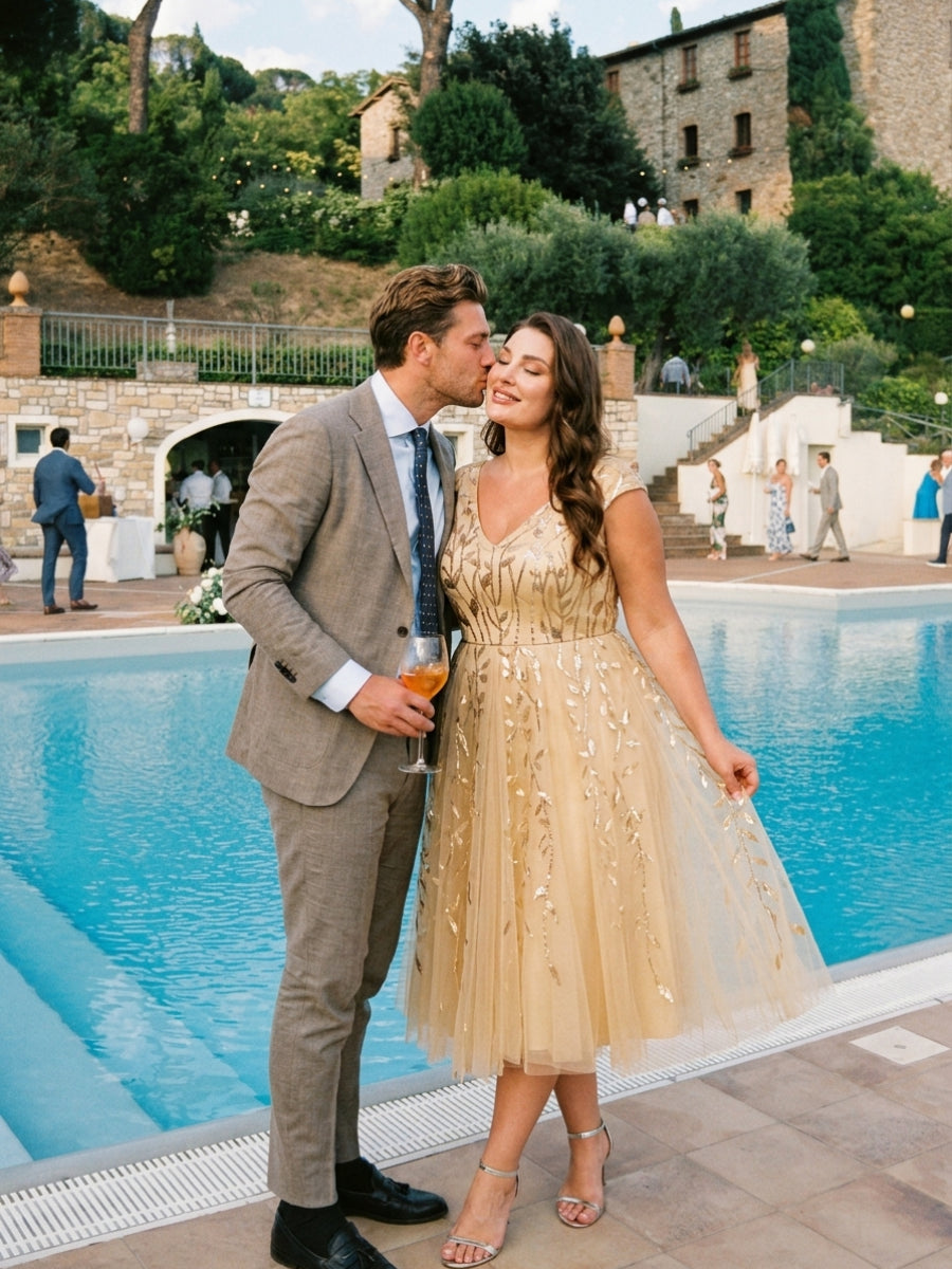 Robe midi sans manches col en V à sequins et coupe évasée #Couleur_Dorée