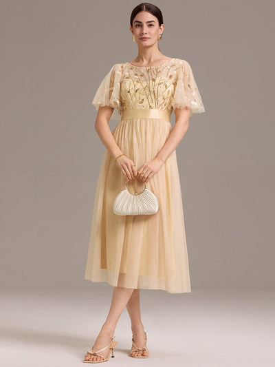 ever TAYLOR|Robe invitée mariage mi-longue à paillettes et feuilles