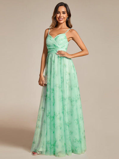 Robe de soirée florale à bretelles spaghetti et taille empire avec col en V
