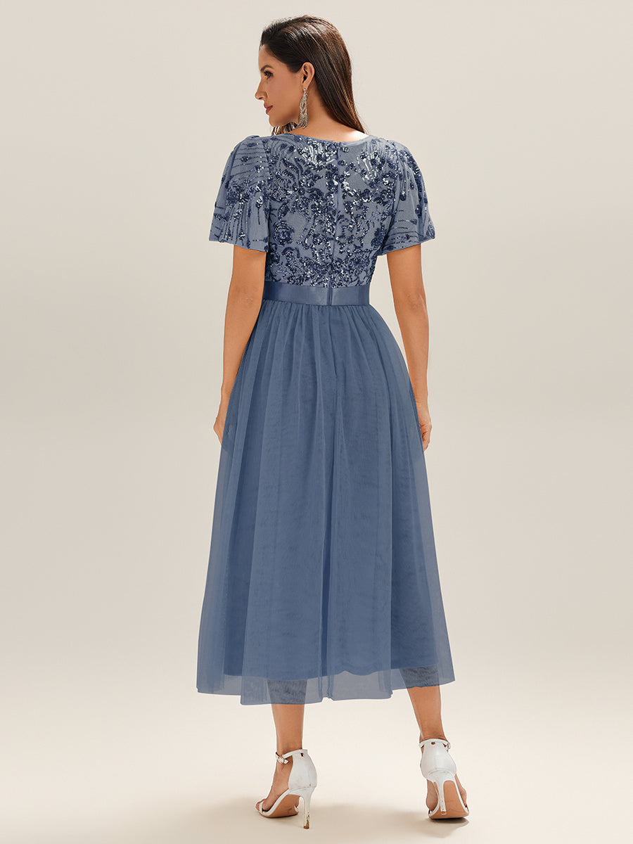 Robe de soirée à col en V profond et manches à volants et sequins #Couleur_Marine Fume