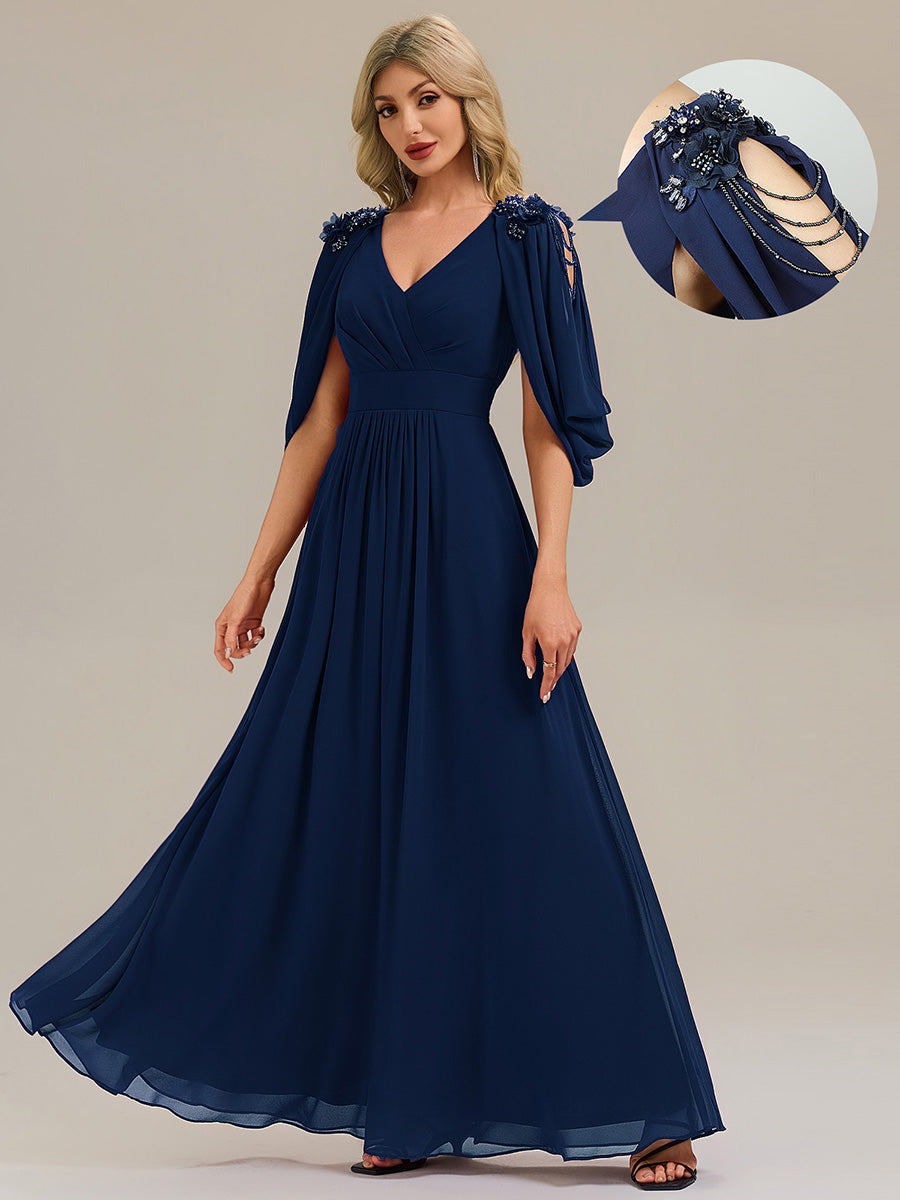 Robe de soirée chic à manches mi-longues en imprimé floral avec appliqués décolleté en V profond coupe A longueur de sol avec détails en perles #Couleur_Bleu Marine