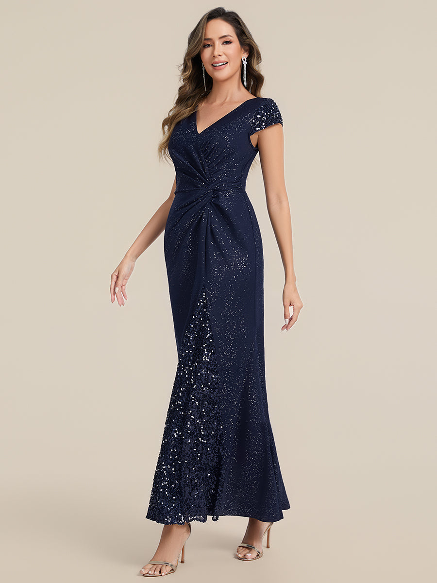 Robe moulante à manches courtes en stretch élevé avec décolleté en V noué et détails en sequins #Couleur_Bleu Marine