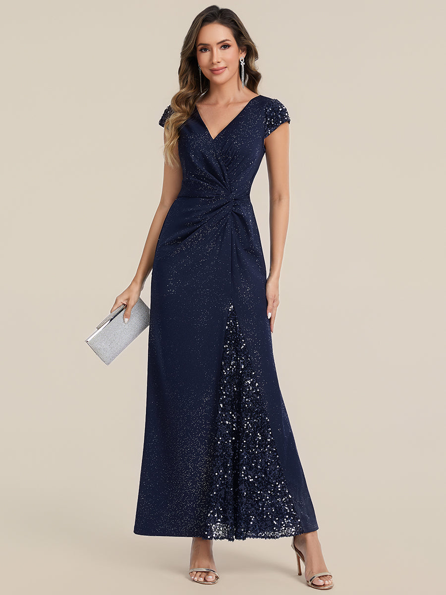 Robe moulante à manches courtes en stretch élevé avec décolleté en V noué et détails en sequins #Couleur_Bleu Marine