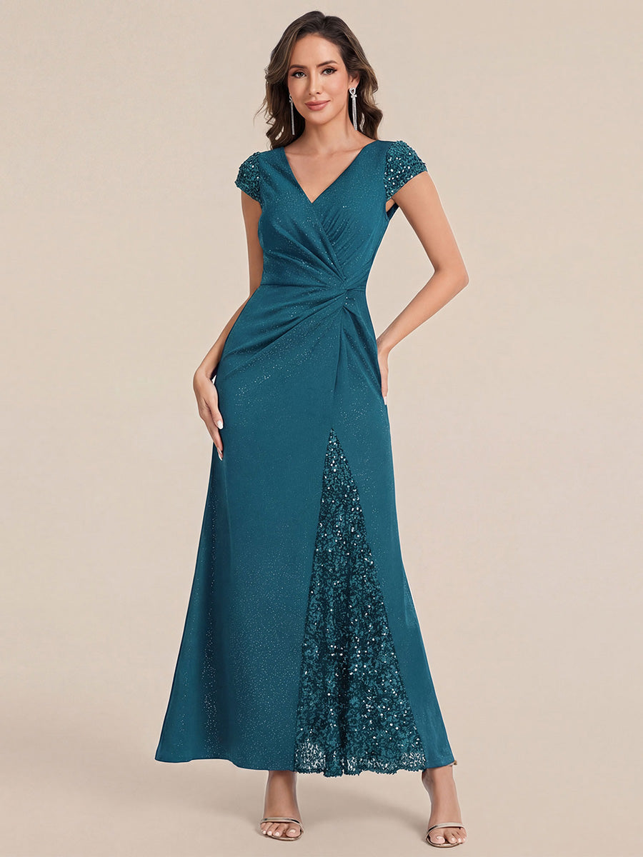 Robe moulante à manches courtes en stretch élevé avec décolleté en V noué et détails en sequins #Couleur_Bleu Sarcelle