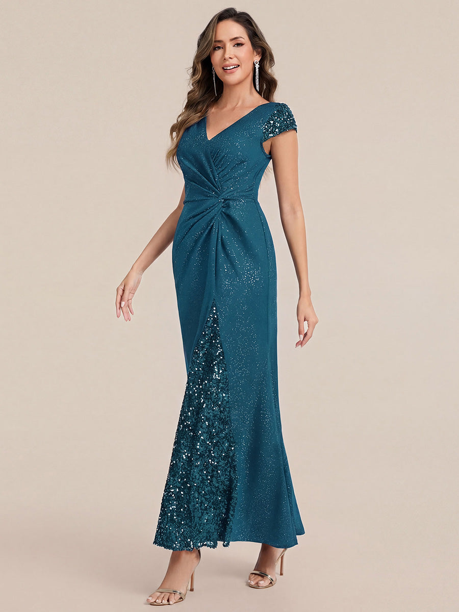 Robe moulante à manches courtes en stretch élevé avec décolleté en V noué et détails en sequins #Couleur_Bleu Sarcelle