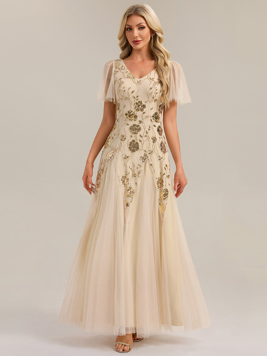 Robe longue à manches courtes en sequins avec volants et décolleté en V #Couleur_Dorée