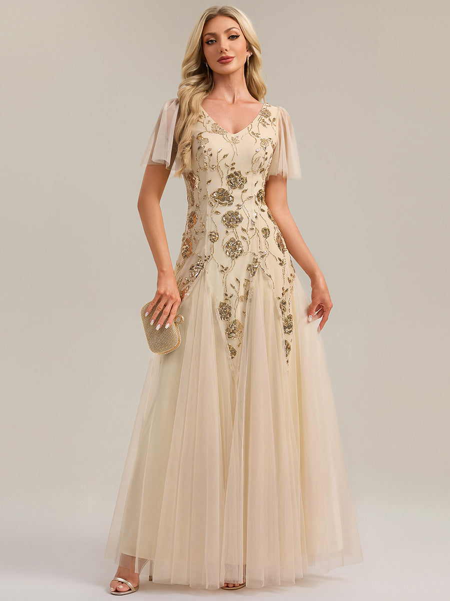 Robe longue à manches courtes en sequins avec volants et décolleté en V #Couleur_Dorée
