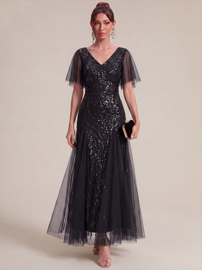 Robe longue en tulle à paillettes avec manches volantées