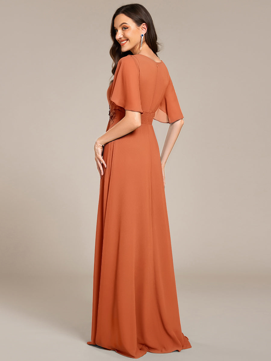 Robe de soirée trapèze à manches courtes et appliques plissées #Couleur_Melon au brandy