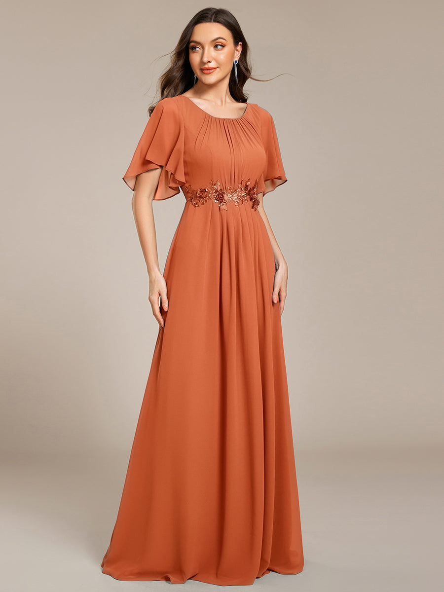 Robe de soirée trapèze à manches courtes et appliques plissées #Couleur_Melon au brandy
