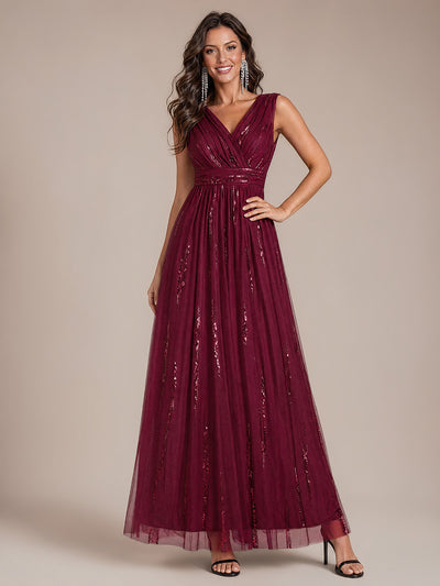 Robe longue sans manches en tulle à paillettes drapé