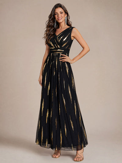 Robe longue sans manches en tulle à paillettes drapé