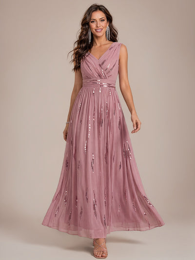 Robe longue sans manches en tulle à paillettes drapé
