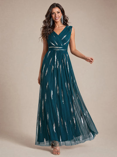 Robe longue sans manches en tulle à paillettes drapé