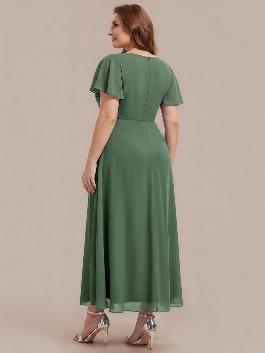 Robe longue maxi ligne A avec manches à volants col en V ornée de strass #Couleur_Eukalyptus Grün