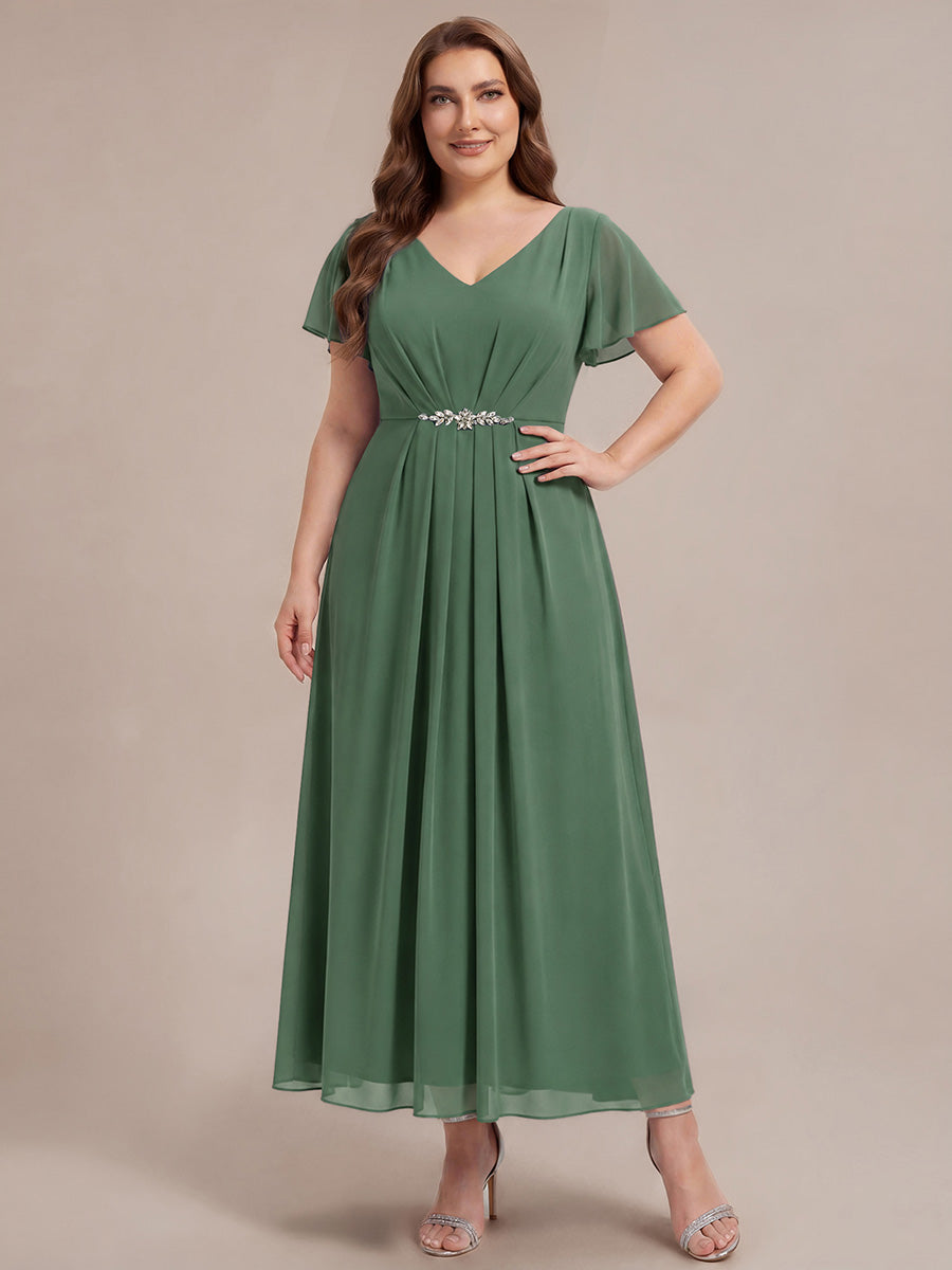 Robe longue maxi ligne A avec manches à volants col en V ornée de strass #Couleur_Eukalyptus Grün
