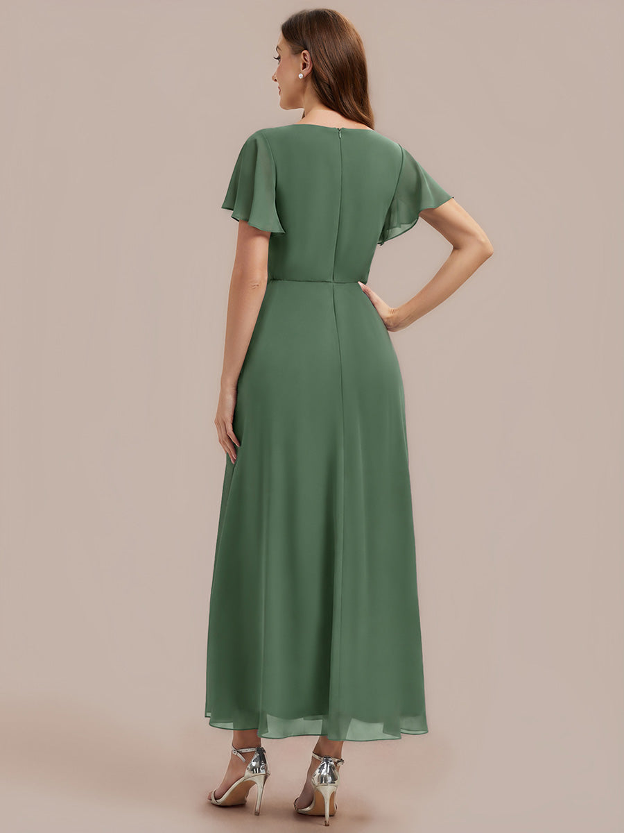 Robe longue maxi ligne A avec manches à volants col en V ornée de strass #Couleur_Eukalyptus Grün