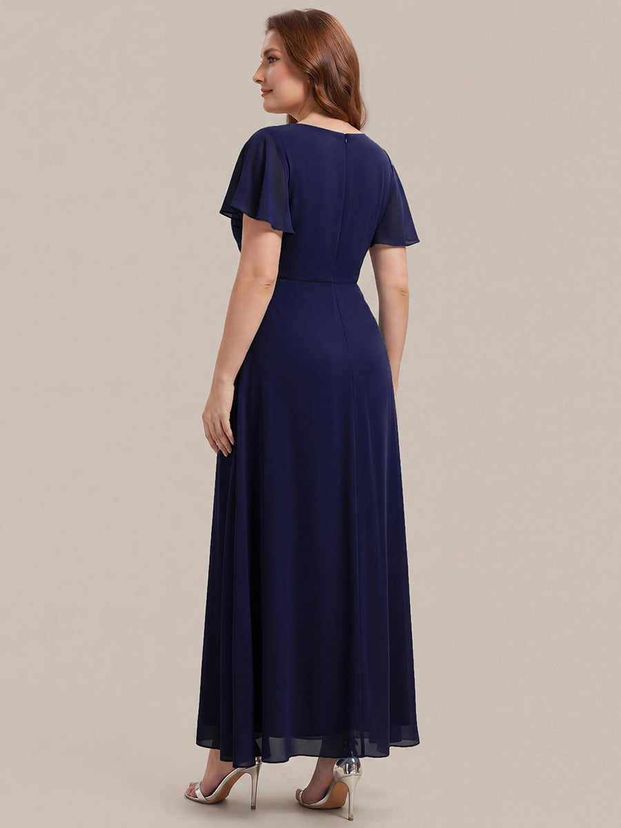 Robe longue maxi ligne A avec manches à volants col en V ornée de strass #Couleur_Bleu Marine