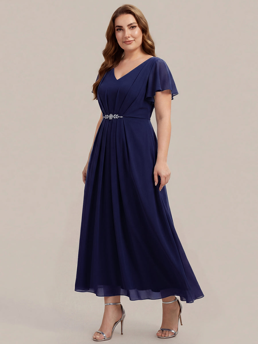 Robe longue maxi ligne A avec manches à volants col en V ornée de strass #Couleur_Bleu Marine