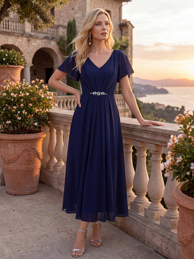 Robe d'invitée à col en V orné de strass et manches à volants