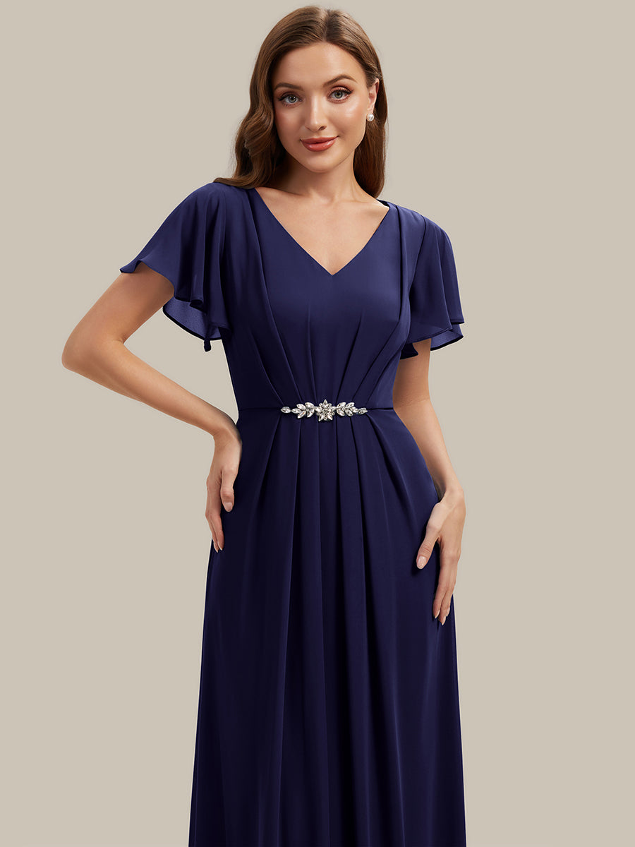 Robe longue maxi ligne A avec manches à volants col en V ornée de strass #Couleur_Bleu Marine