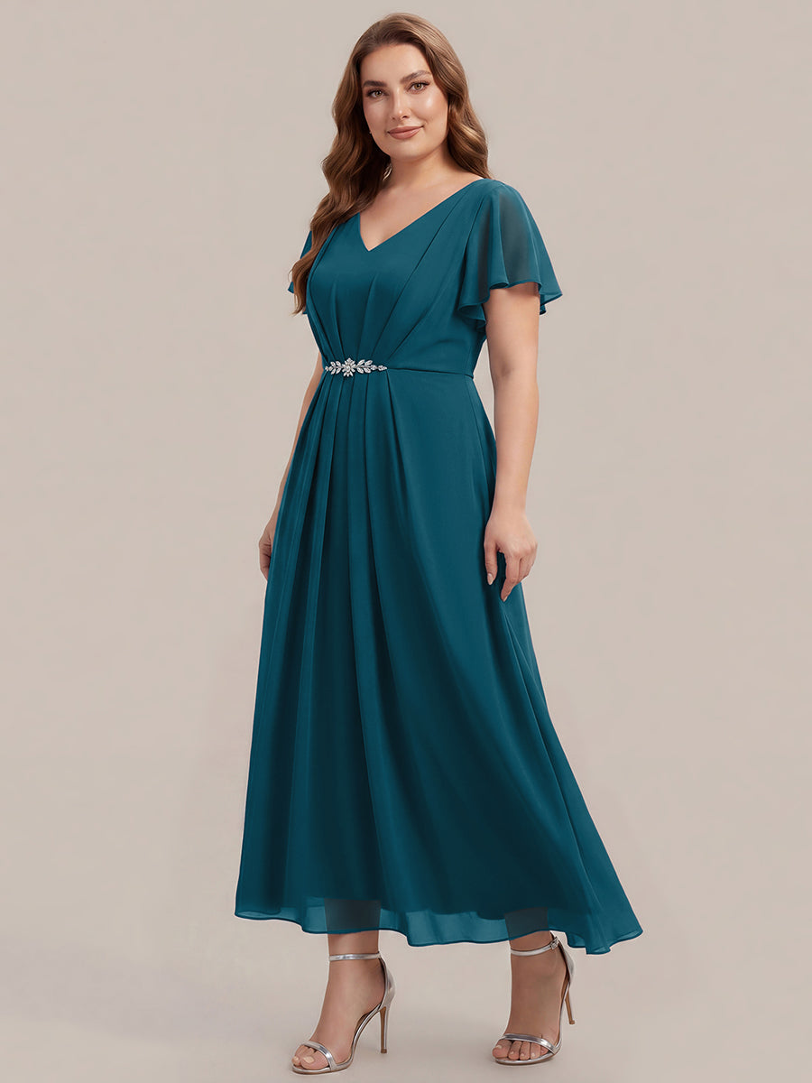 Robe longue maxi ligne A avec manches à volants col en V ornée de strass #Couleur_Bleu Sarcelle