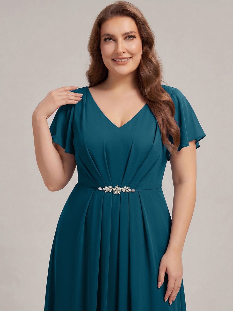 Robe longue maxi ligne A avec manches à volants col en V ornée de strass #Couleur_Bleu Sarcelle