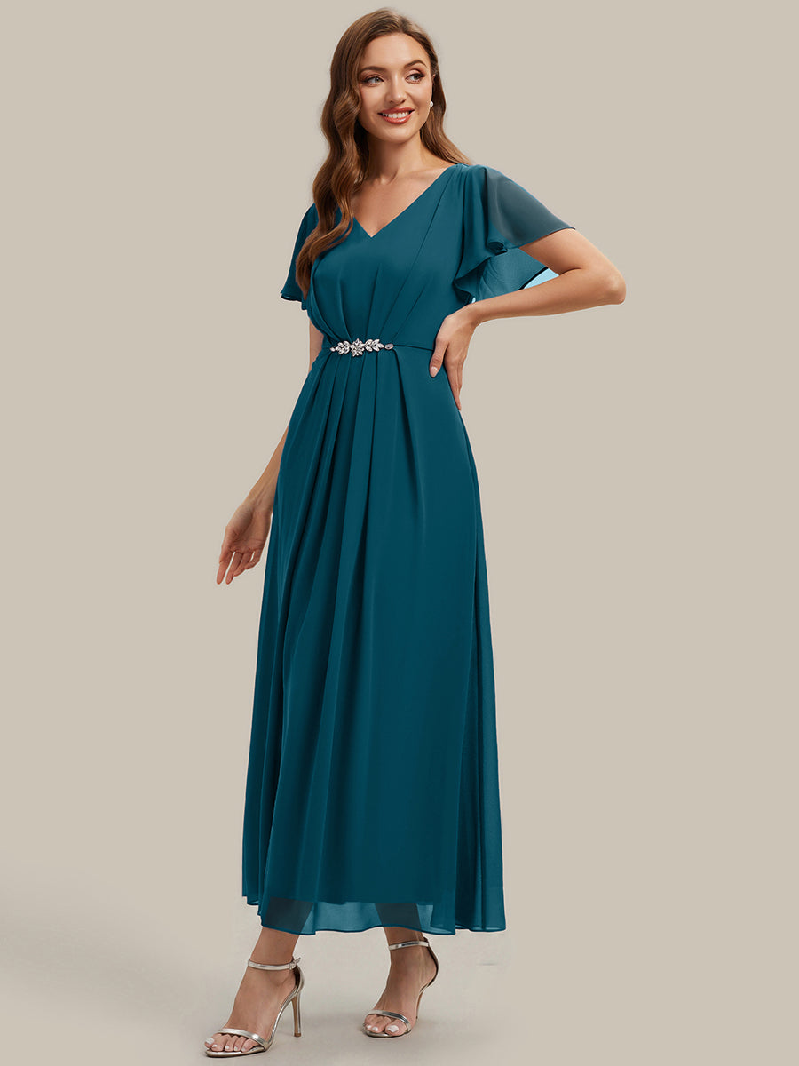 Robe longue maxi ligne A avec manches à volants col en V ornée de strass #Couleur_Bleu Sarcelle