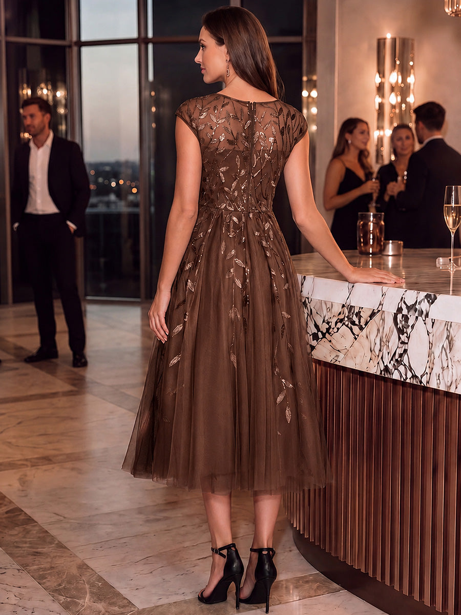 Robe midi évasée à manches courtes en patchwork transparent #Couleur_Braun