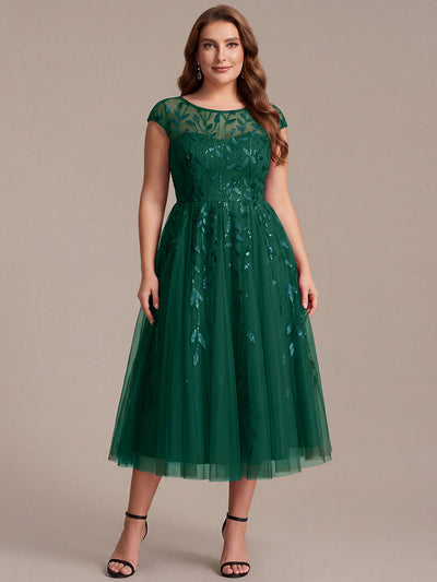 Robe invitée mariage grande taille à paillettes coupe trapèze