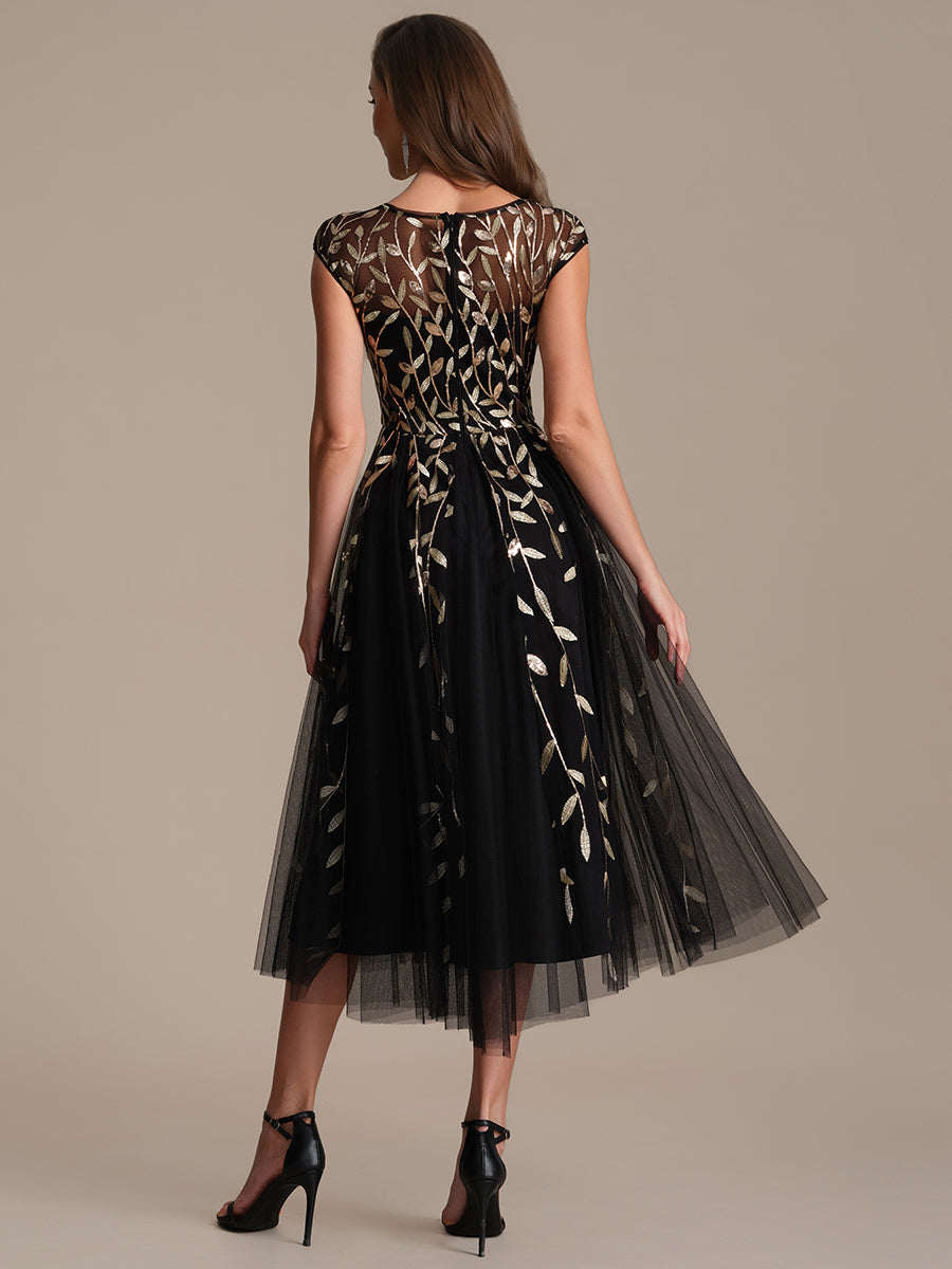 Robe midi évasée à manches courtes en patchwork transparent #Couleur_Noir & Or