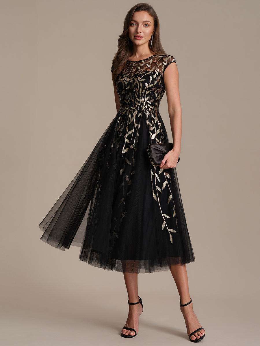 Robe midi évasée à manches courtes en patchwork transparent #Couleur_Noir & Or