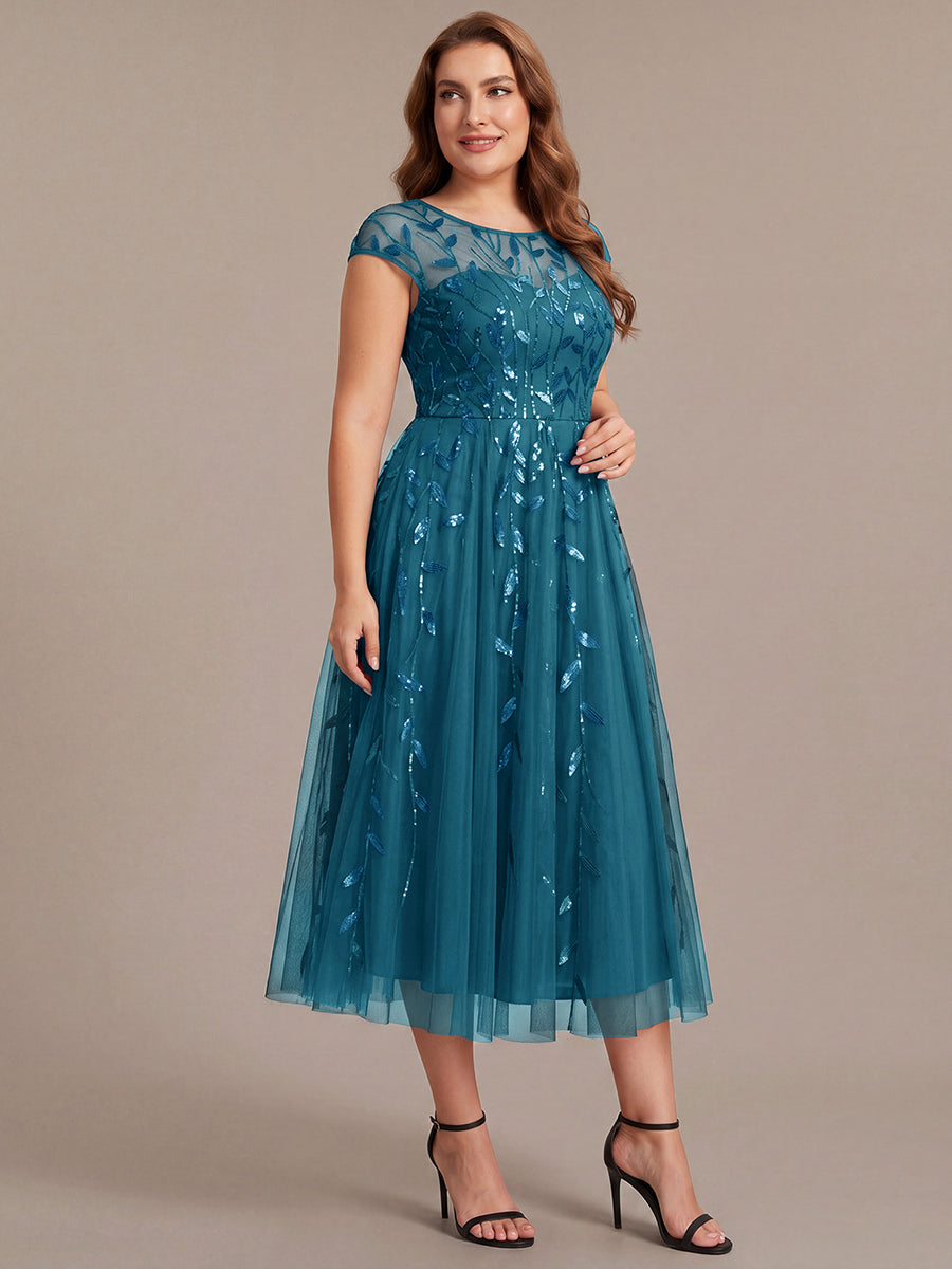 Robe midi évasée à manches courtes en patchwork transparent #Couleur_Bleu Sarcelle