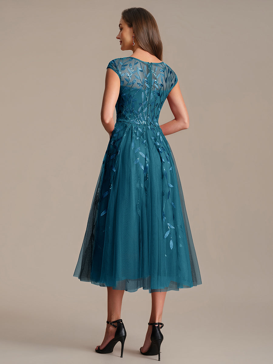 Robe midi évasée à manches courtes en patchwork transparent #Couleur_Bleu Sarcelle