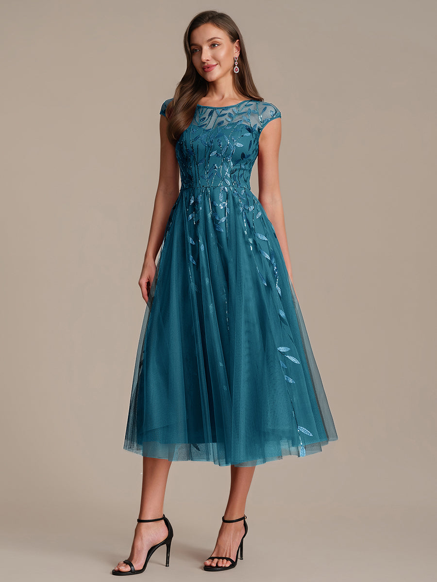 Robe midi évasée à manches courtes en patchwork transparent #Couleur_Bleu Sarcelle