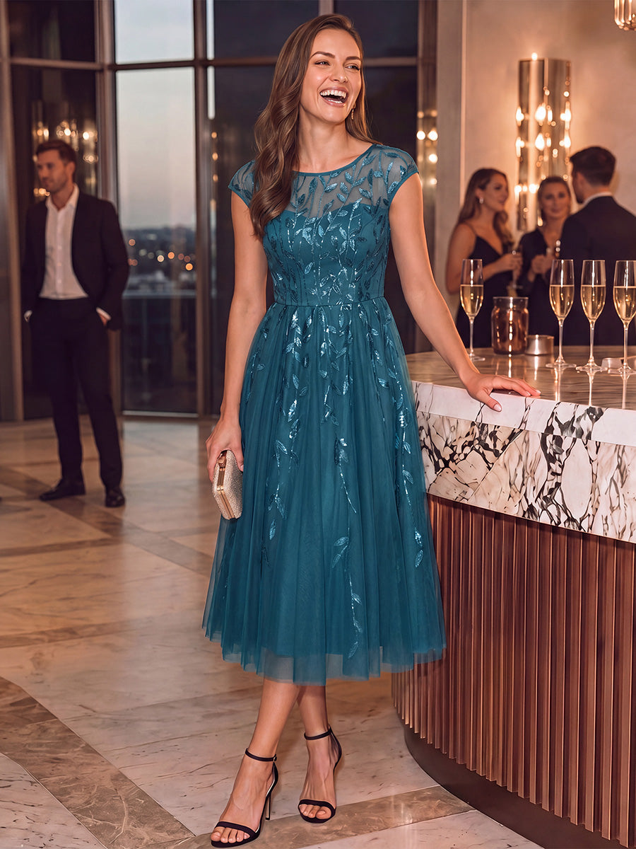 Robe midi évasée à manches courtes en patchwork transparent #Couleur_Bleu Sarcelle