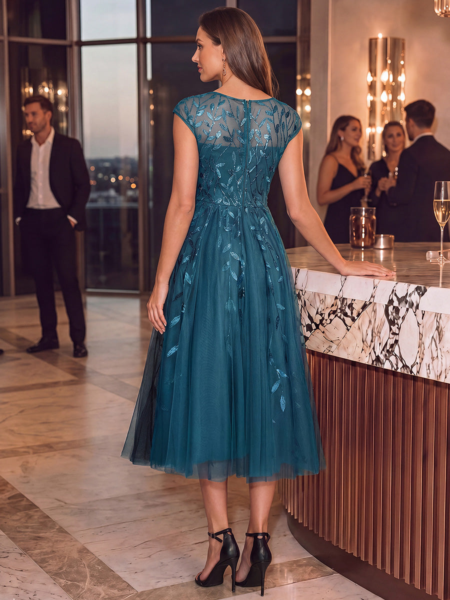 Robe midi évasée à manches courtes en patchwork transparent #Couleur_Bleu Sarcelle