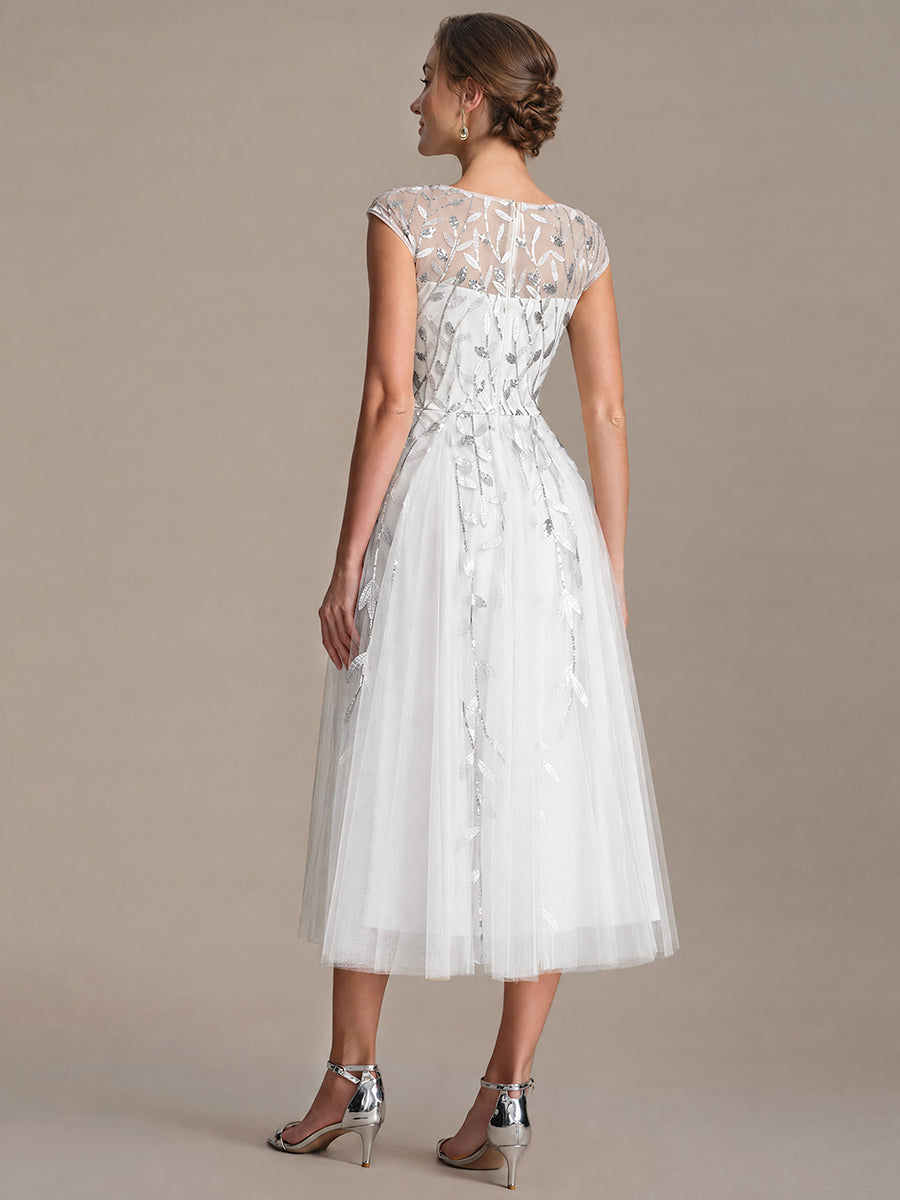 Robe midi évasée à manches courtes en patchwork transparent #Couleur_Blanc